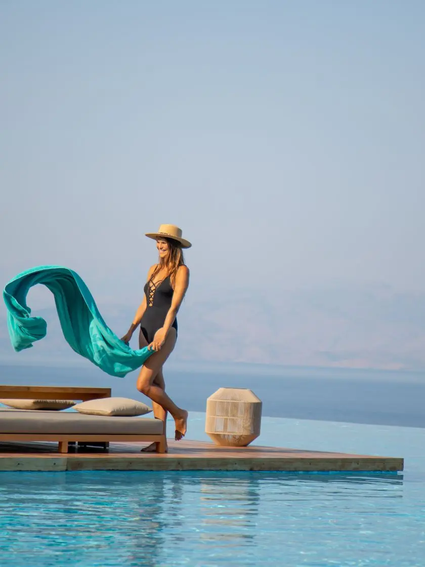 woman by the infinity pool in Corfu