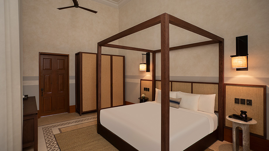 A canopy bed sits elegantly in a luxurious room at Hacienda Xcanatun, Angsana Heritage Collection.