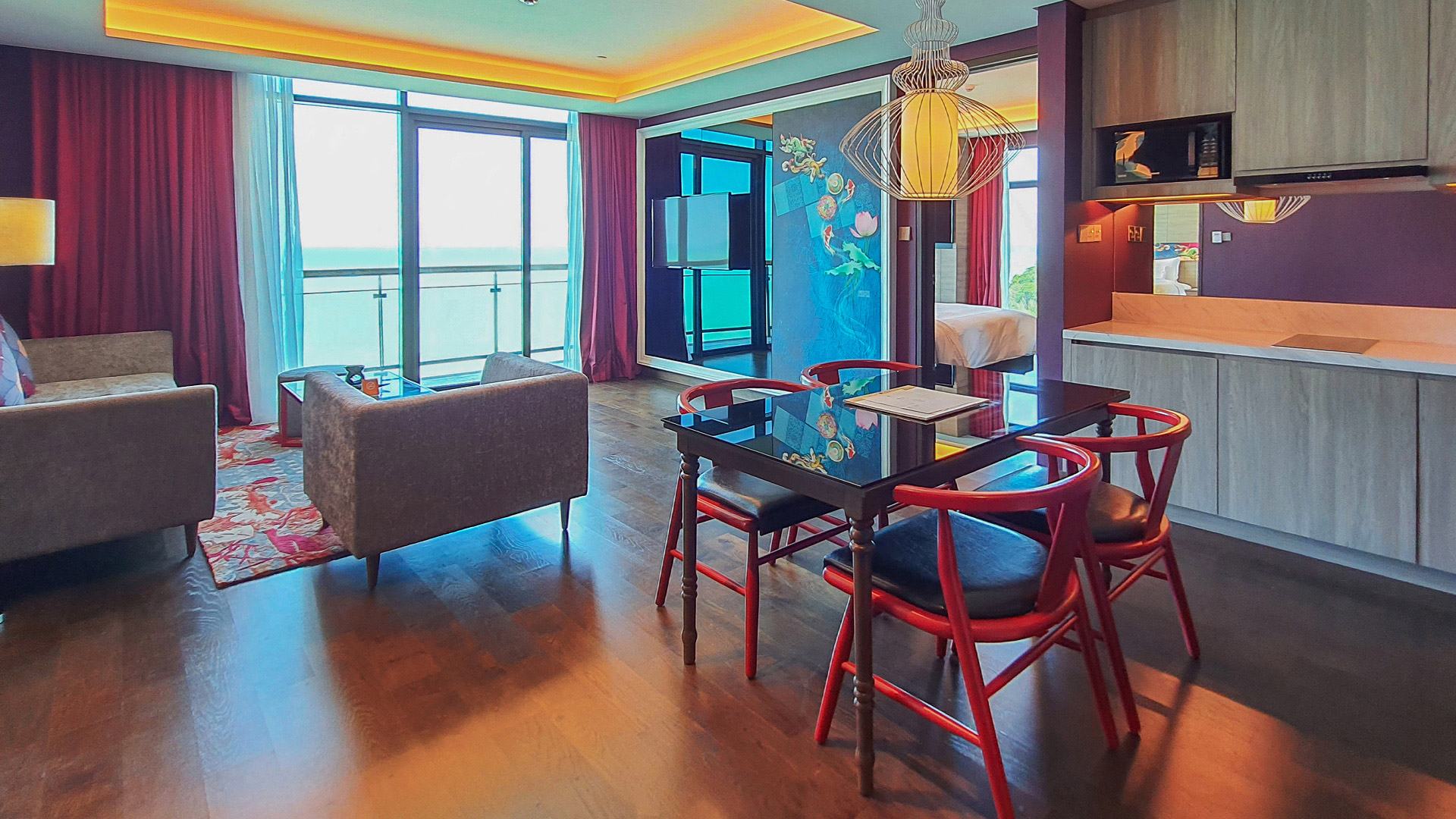 Cozy living area with ocean view at Angsana Teluk Bahang Penang, featuring modern decor.