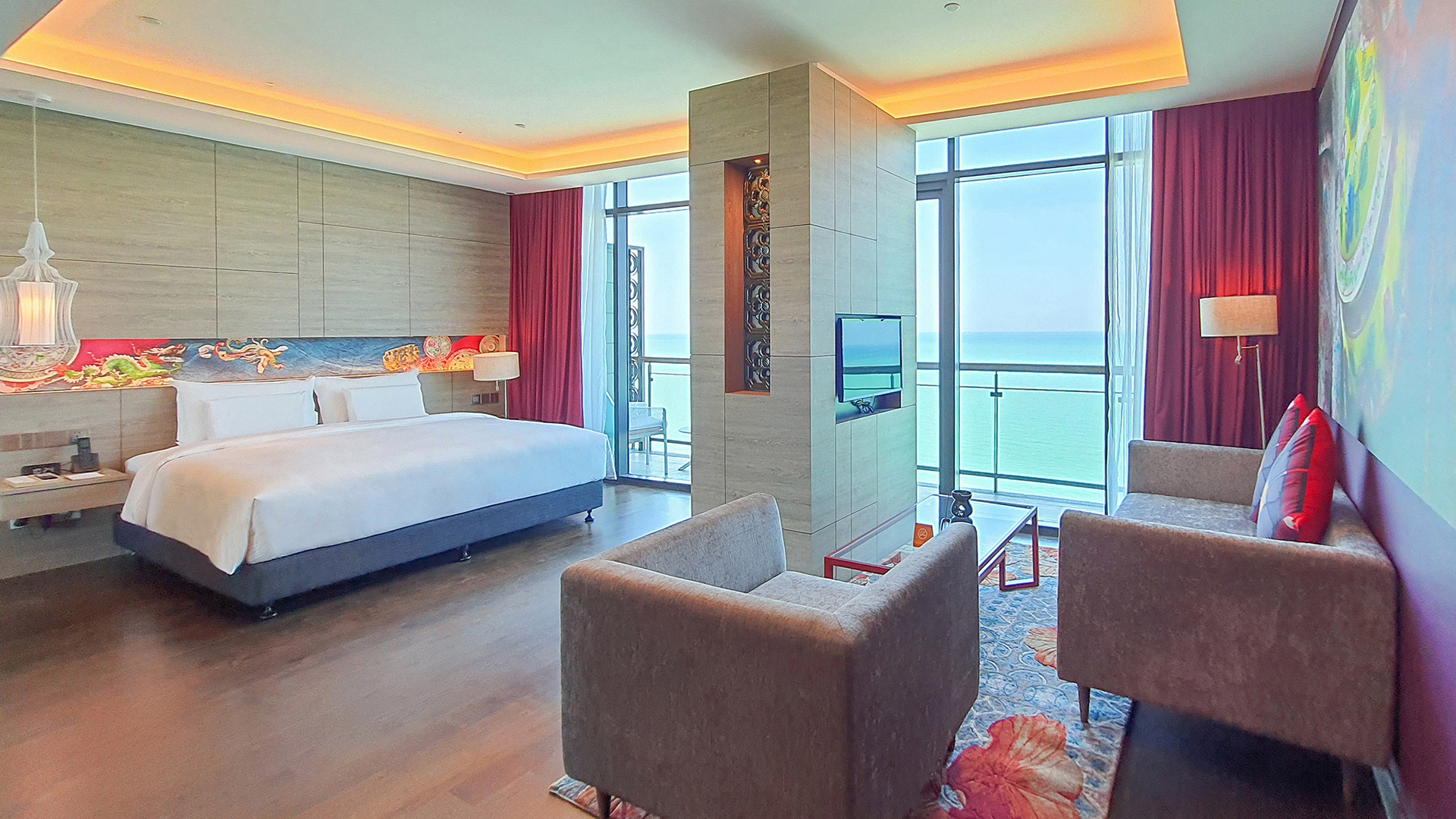 Luxurious bedroom with ocean view, modern decor at Angsana Teluk Bahang Penang.
