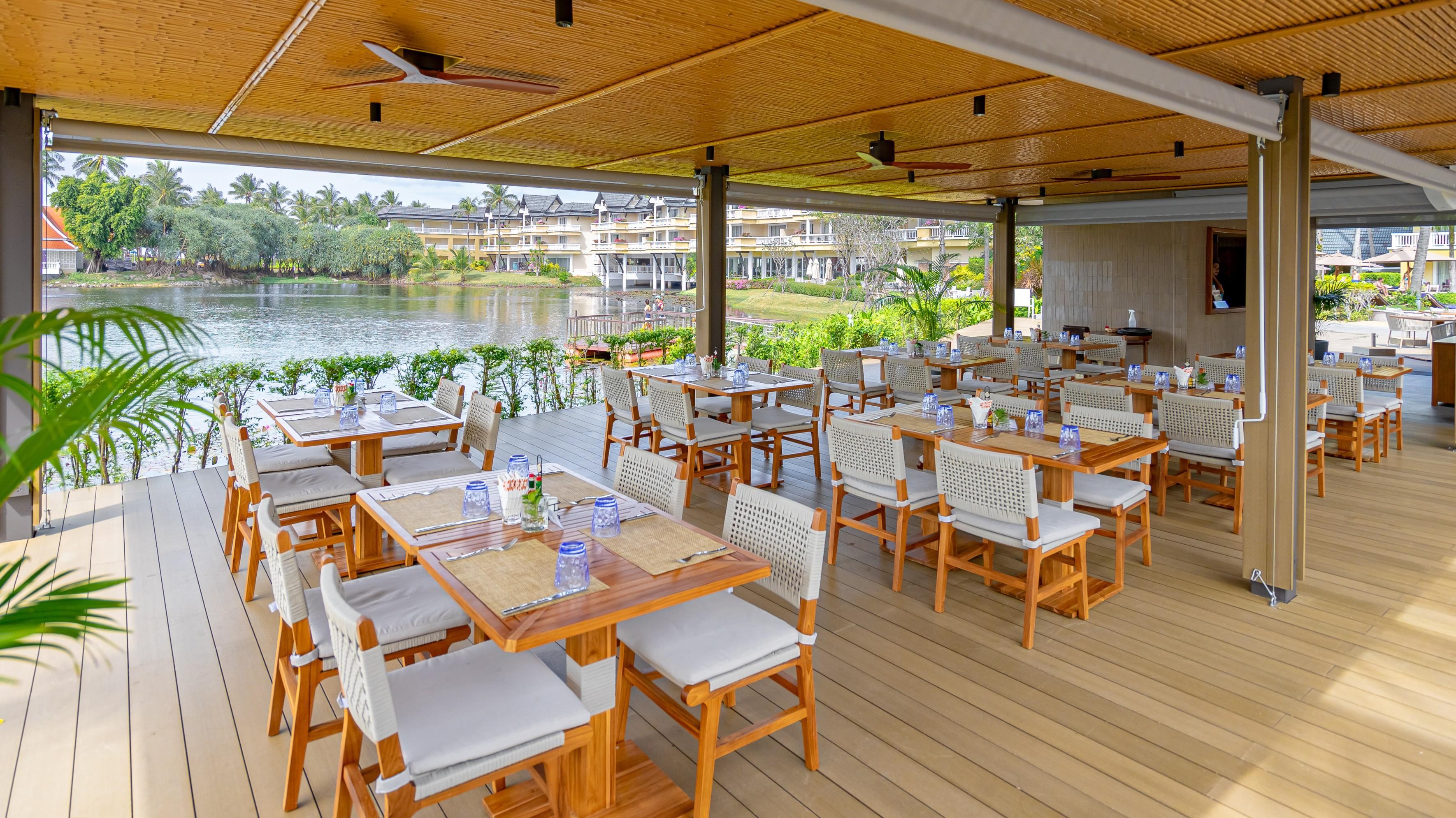 Poolside Restaurant with views of the Lagoon and the Pool